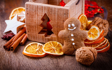 Картинка праздничные угощения орех корица апельсин человечек пряничный