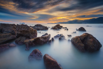 Картинка природа побережье вечер море камни скалы облака небо