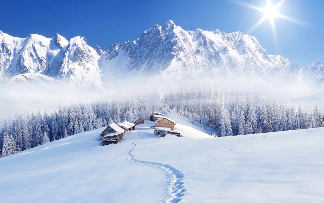 Обои картинки фото природа, зима, солнце, лес, тропинка, туман, деревья, домики, небо, снег, горы