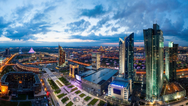 Обои картинки фото astana city,  kazakhstan, города, астана , казахстан, облака, небо, высотки, панорама, здания
