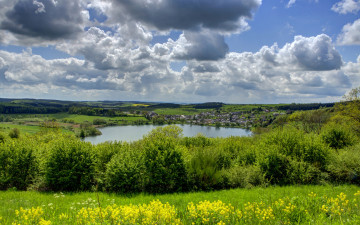 Картинка природа реки озера трава кусты поля озеро ellscheid германия облака небо деревня дома зелень