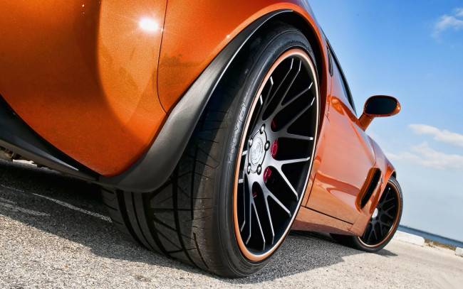 Обои картинки фото автомобили, фрагменты автомобиля, chevrolet, corvette, z06, оранжевый, ракурс
