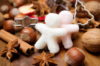 Картинка праздничные угощения бадьян орехи корица фигурки