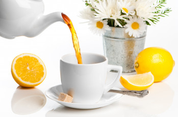 Картинка еда напитки Чай лимон блюдце напиток заварник ложечка чашка цветы ромашки чай сахар ведёрко