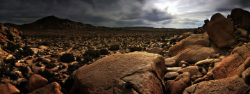 Картинка природа пустыни кусты камни холмы тучи