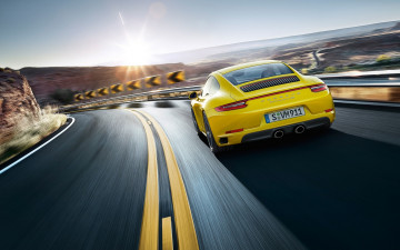 Картинка автомобили porsche 4s 911 carrera дорога трасса поворот шоссе скорость желтый