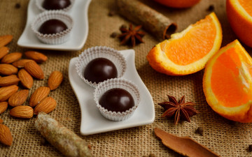 Картинка еда разное dessert chocolate candy orange almonds десерт шоколад шоколадные конфеты оранжевый миндаль