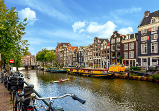 Картинка города амстердам+ нидерланды велосипеды баржи дома канал