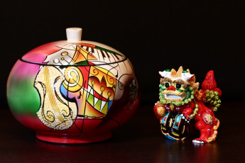 Картинка разное сувениры статуэтка путешествие натюрморт композиция дракон вьетнамский вьетнам ваза безделушки