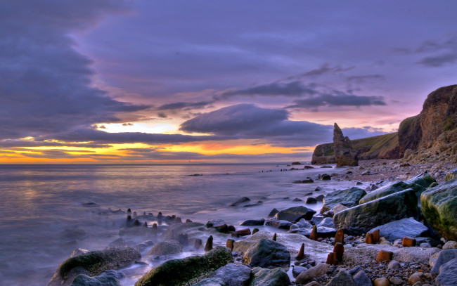 Обои картинки фото sunset, природа, побережье, пляж, море, камни, закат, облака