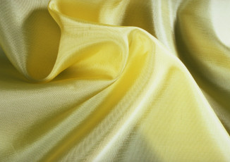 Картинка разное текстуры ткань желтая зеленоватая складки блеск