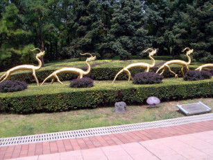 Картинка разное садовые+и+парковые+скульптуры драконы парк клумбы