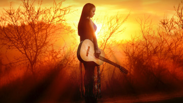 Картинка музыка -другое девушка гитара инструмент солнце природа вечер закат сияние небо жёлтый золотой туман свечение струнный музыкант пейзаж поза брюнетка платье