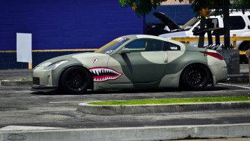 Картинка автомобили выставки+и+уличные+фото парковка акула