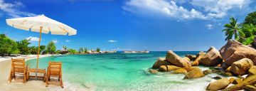 Картинка природа тропики океан побережье панорама зонтик камни пальмы