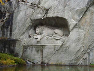 Картинка разное рельефы статуи музейные экспонаты лев скульптура скала