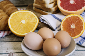 Картинка еда разное яйца цитрусы апельсин хлеб круассан
