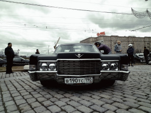 Картинка автомобили выставки+и+уличные+фото черный cadillac
