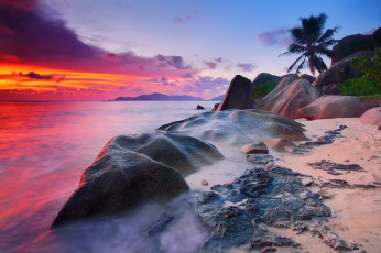 Картинка природа тропики облака небо кусты деревья пальмы пляж выдержка вода скалы камни вечер утро море индийский океан остров ла-диг сейшельские острова