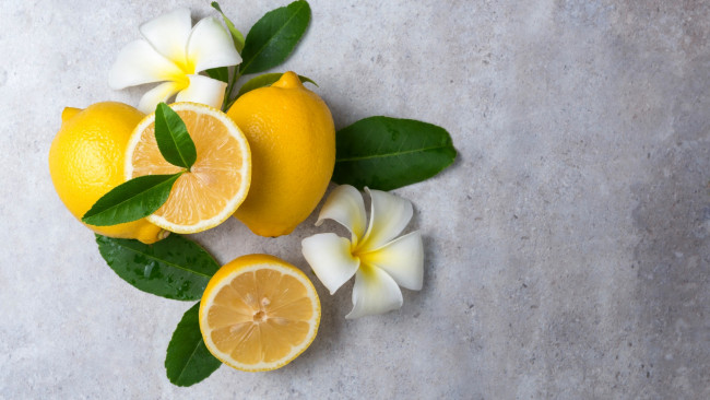 Обои картинки фото еда, цитрусы, лимоны, плюмерия
