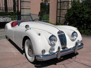 Картинка 1957 jaguar xk 140 roadster автомобили ретро