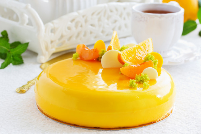 Обои картинки фото еда, торты, чашка, дольки, персик, апельсин, мята, блюдце