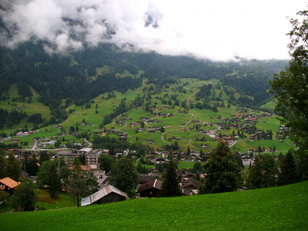 Обои картинки фото grindelwald, switzerland, города, пейзажи, дымка, дома, горы