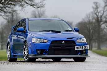 Картинка автомобили mitsubishi синий 2009г evolution lancer x fq-400