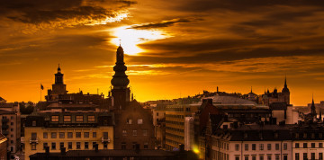 Картинка города стокгольм+ швеция дома здания город крыши свет солнце небо рассвет утро стокгольм