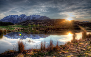Картинка природа восходы закаты трава горы солнце небо вода растительность