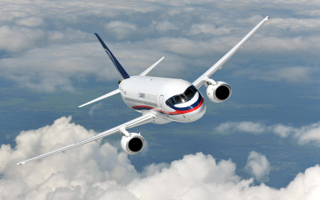 Обои картинки фото sukhoi, superjet, 100, авиация, пассажирские, самолёты, облака, полет, лайнер