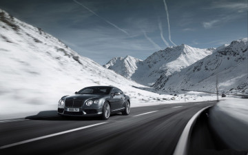 Картинка bentley+continental+v8 автомобили bentley темный бентли шоссе трасса дорога скорость серый горы снег