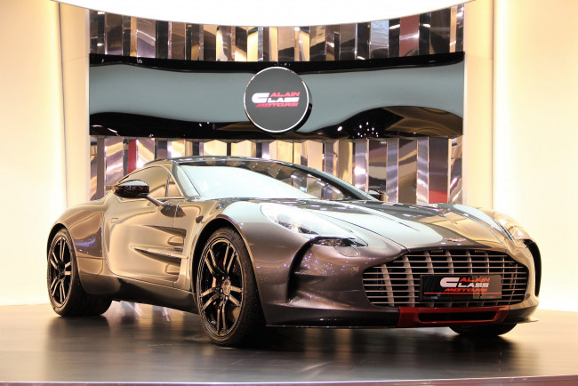 Обои картинки фото автомобили, aston martin, золотистый