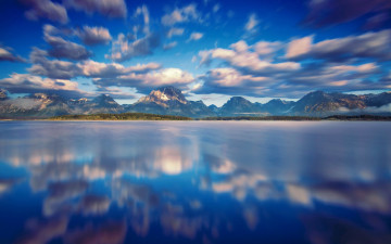 Картинка природа реки озера озеро джексон гранд-титон горы небо вода отражения облака национальный парк штат вайоминг сша