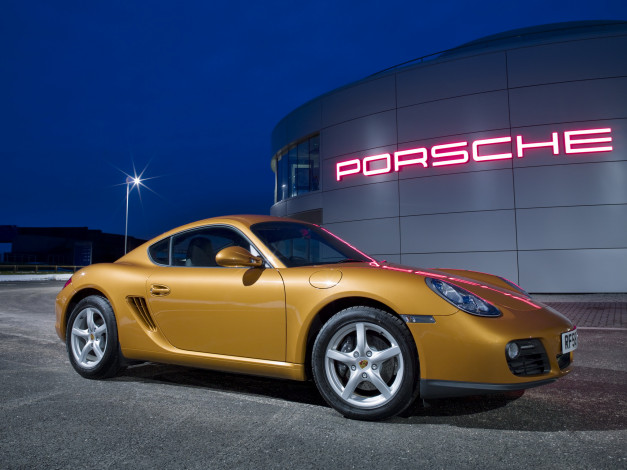 Обои картинки фото автомобили, porsche, uk-spec, cayman, 2009, 987c, желтый