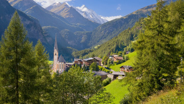 Картинка heiligenblut village austria города пейзажи деревня горы деревья церковь дома австрия склон