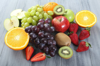 Картинка еда фрукты +ягоды киви лимон апельсин яблоки клубника виноград