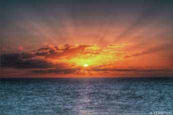 Картинка природа восходы закаты море вода гладь лучи солнце закат