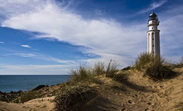 Картинка faro de trafalgar природа маяки трава океан берег дюны маяк следы