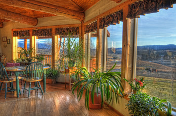 Картинка интерьер веранды террасы балконы окна вазоны стулья стол