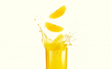 Картинка еда напитки сок ломтики желтый апельсин брызги