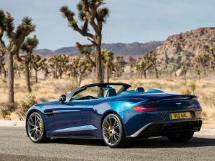 Картинка aston+martin+vanquish+volante автомобили aston+martin синий скалы деревья