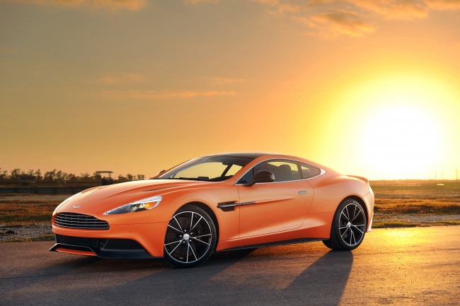 Обои картинки фото 014 aston martin vanquish, автомобили, aston martin, vanquish, оранжевый, закат, aston, martin