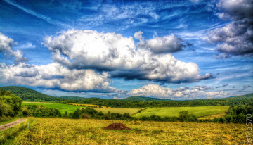 Картинка природа пейзажи дорога трава холмы поле панорама горизонт облака