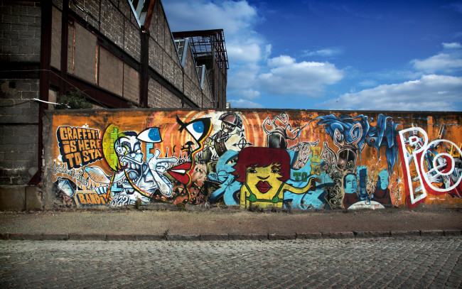 Обои картинки фото graffiti, is, here, to, stay, разное, граффити, рисунки, забор, здание