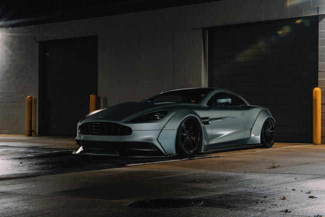 Обои картинки фото aston martin vanquish, автомобили, aston martin, гараж, купе, суперкар, vanquish, aston, martin