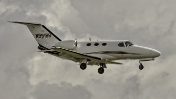 обоя cessna 510, авиация, пассажирские самолёты, самолет, полет, облака, небо