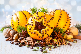 Картинка праздничные угощения орехи декор бадьян гвоздика корица апельсин