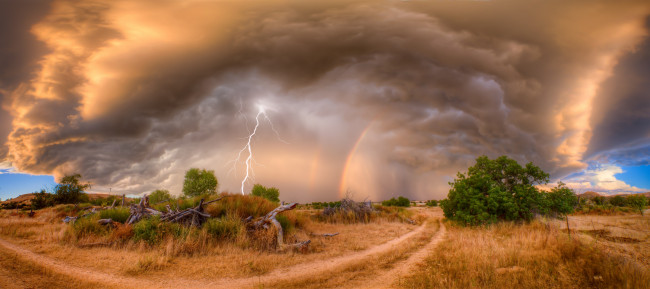 Обои картинки фото природа, молния,  гроза, кусты, трава, радуга, дорога, туча, коряги, стихия
