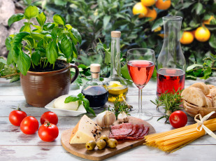 Картинка еда разное оливки бокал красное хлеб масло вино овощи помидоры колбаса чеснок сыр стол спагетти